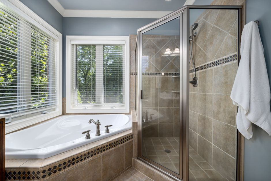 Ensuite Bathroom Renovation on the Wirral: Who Should Supply the Suite and Tiles, You or Your Fitter?