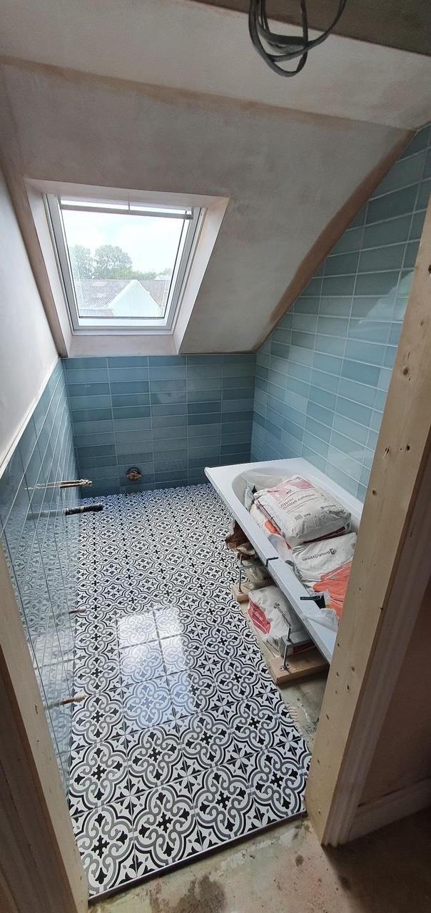 Loft bathroom with teal metro wall tiles fitted by Kew Construction in Liverpool